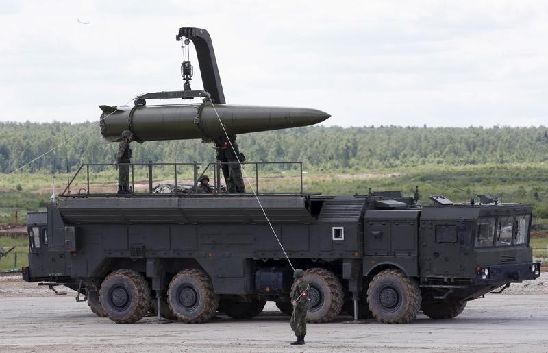 Russian servicemen equip an Iskander tactical missile system at the Army-2015 international military-technical forum in Kubinka, outside Moscow, Russia, June 17, 2015. REUTERS/Sergei Karpukhin