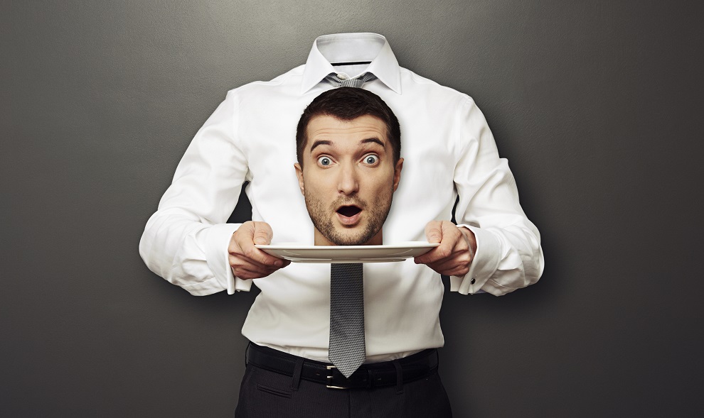 headless man holding surprised head