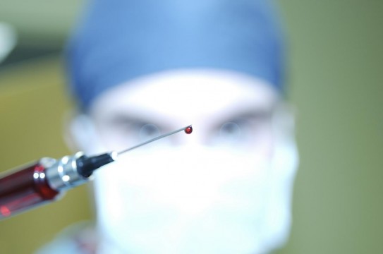 Close-Up-Blood-Drip-Syringe-Doctor